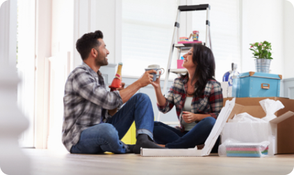 cashback-calc Woman and man sat down celebrating